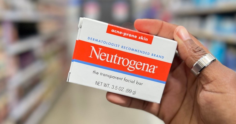 hand holding neutrogena facial bar