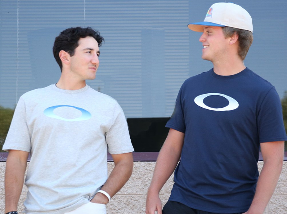 two guys in oakley shirts