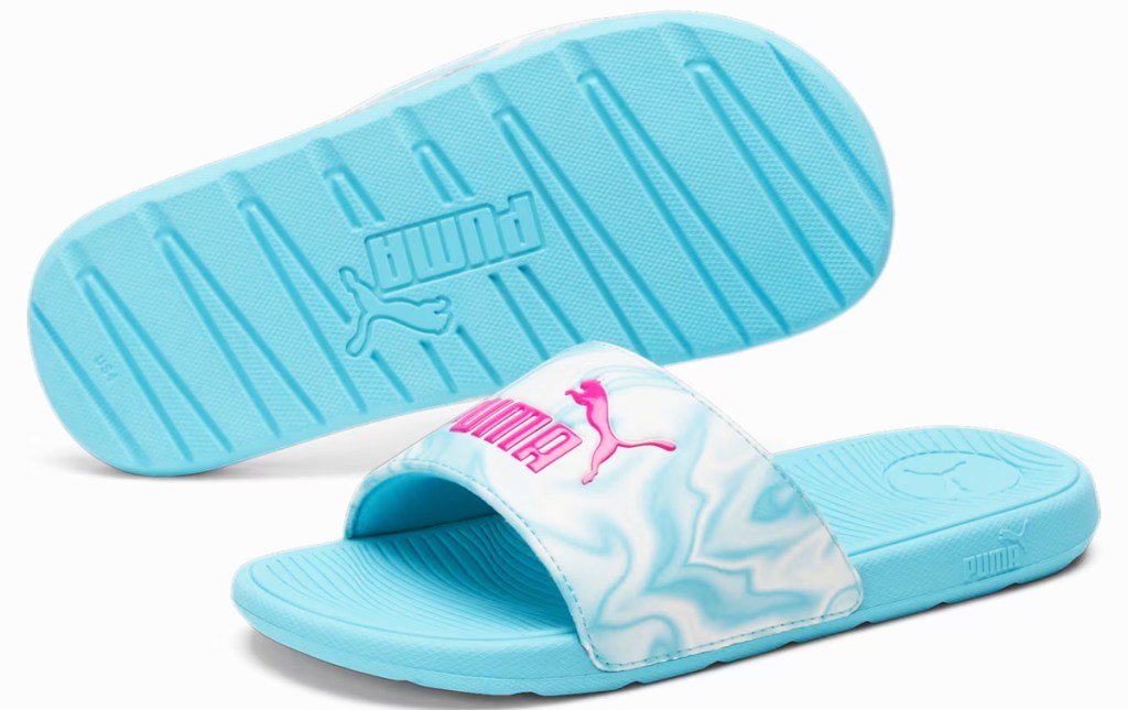 pair of bright blue, white, and pink puma slides