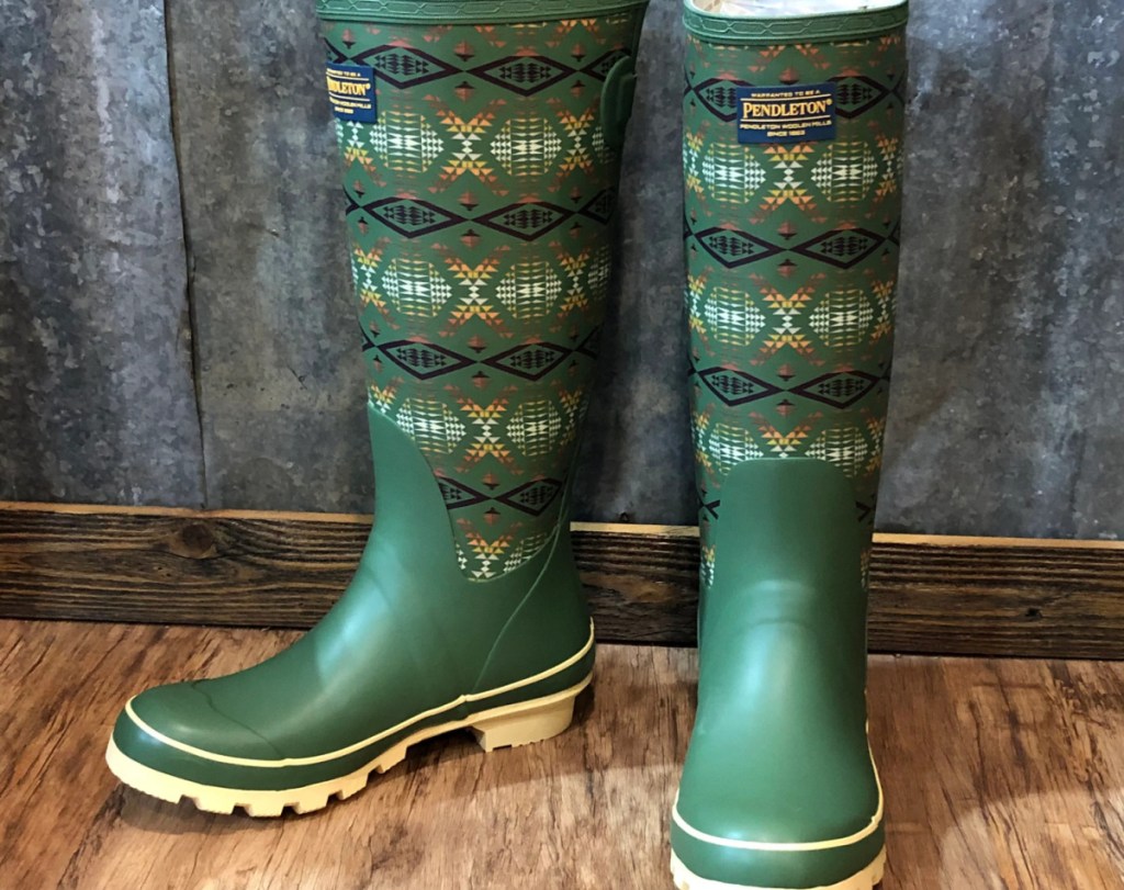 pair of tall green geometric print rain boots