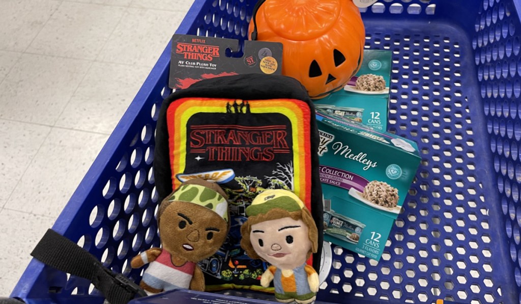 pet Halloween toys and food in store cart