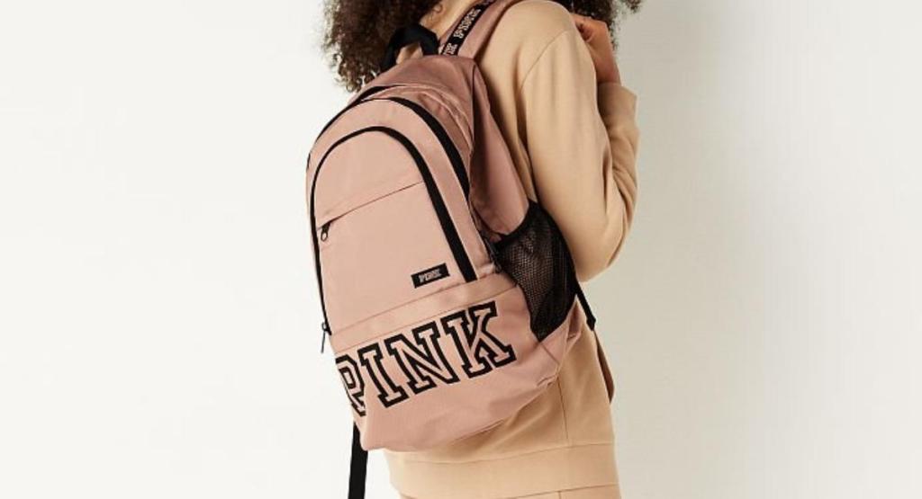 woman wearing Pink Collegiate Backpack