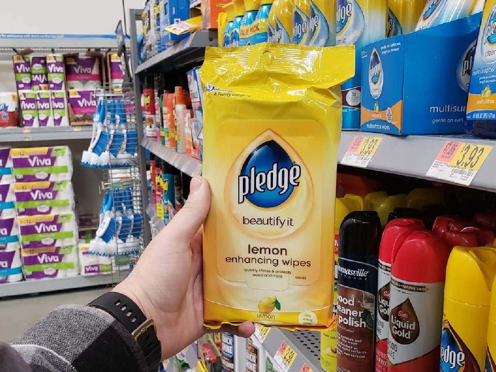 hand holding pack of wood wipes in store