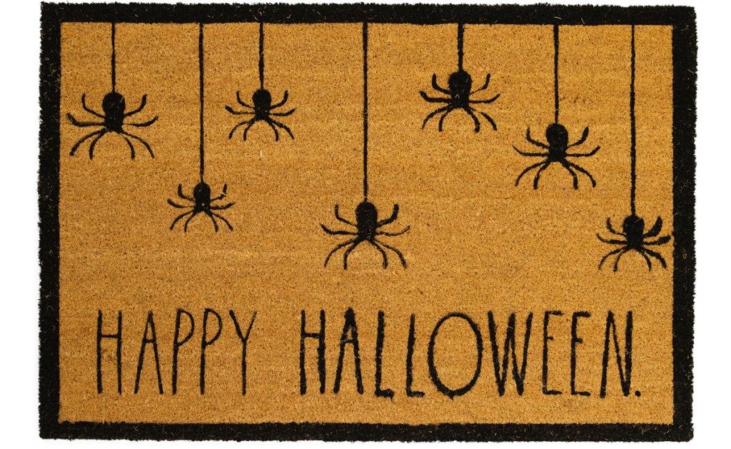 doormat with spiders that says happy halloween