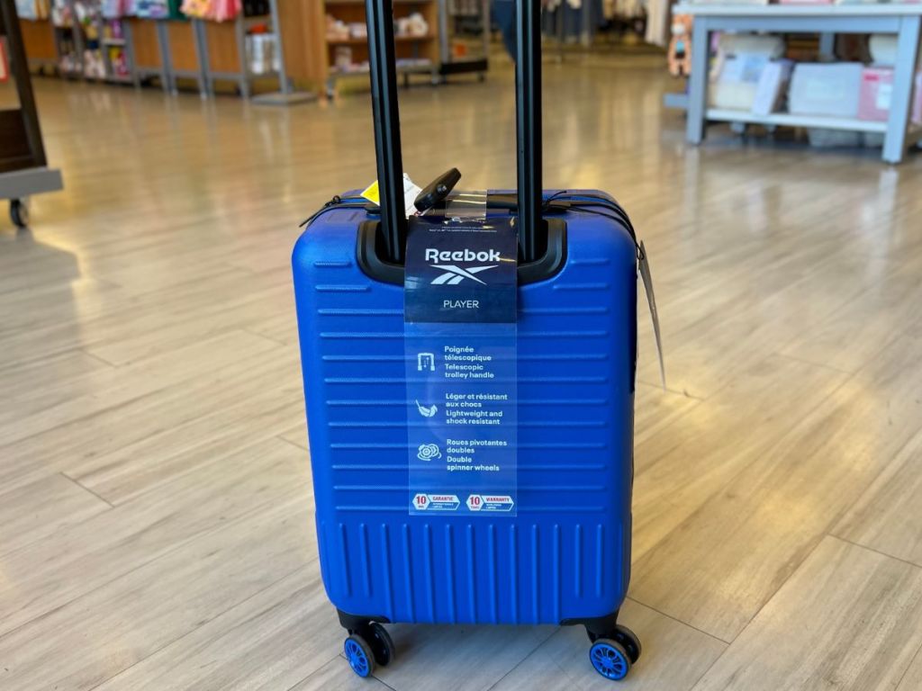 A blue Reebok Luggage piece