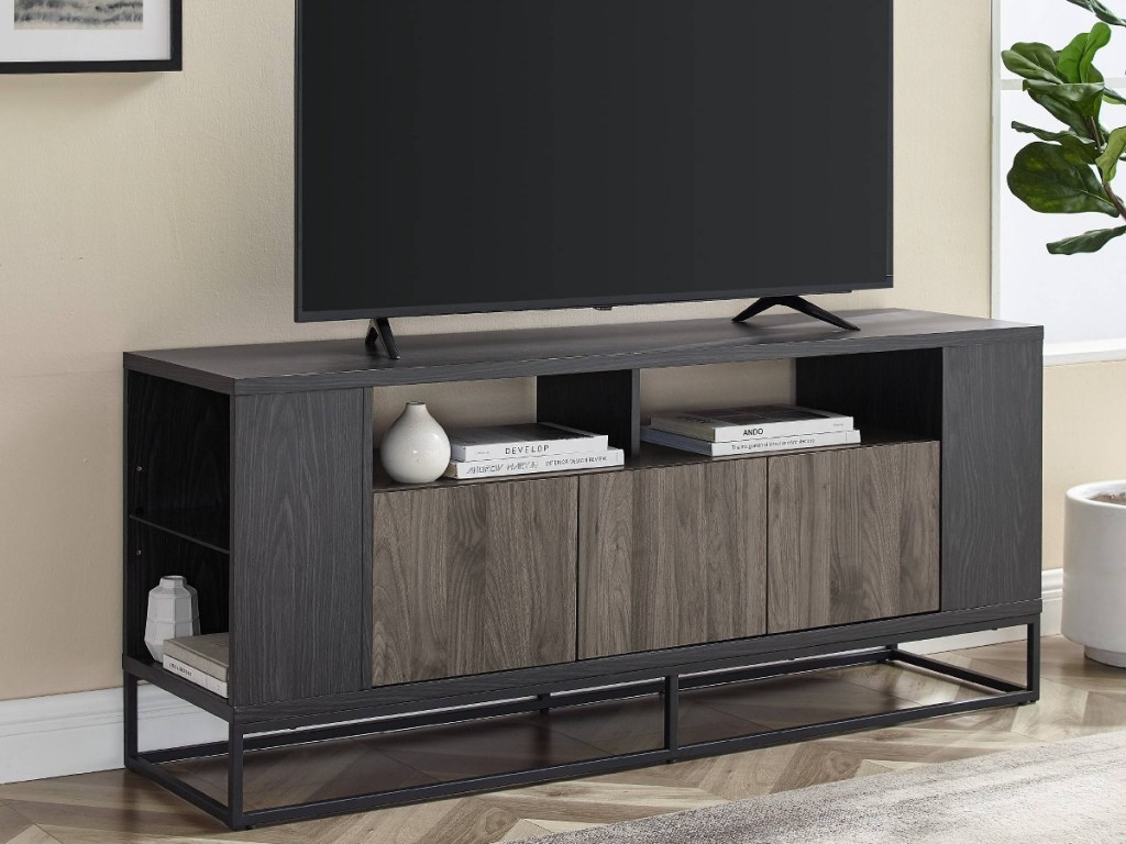 large TV on TV stand in home