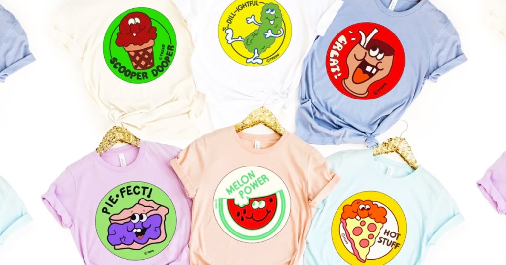 Scratch & Sniff Sticker Costume Tees on hangers