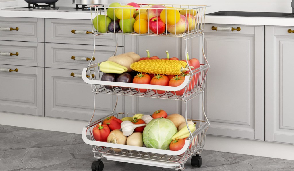 three tier rolling storage cart filled with fruit and vegetables in kitchen