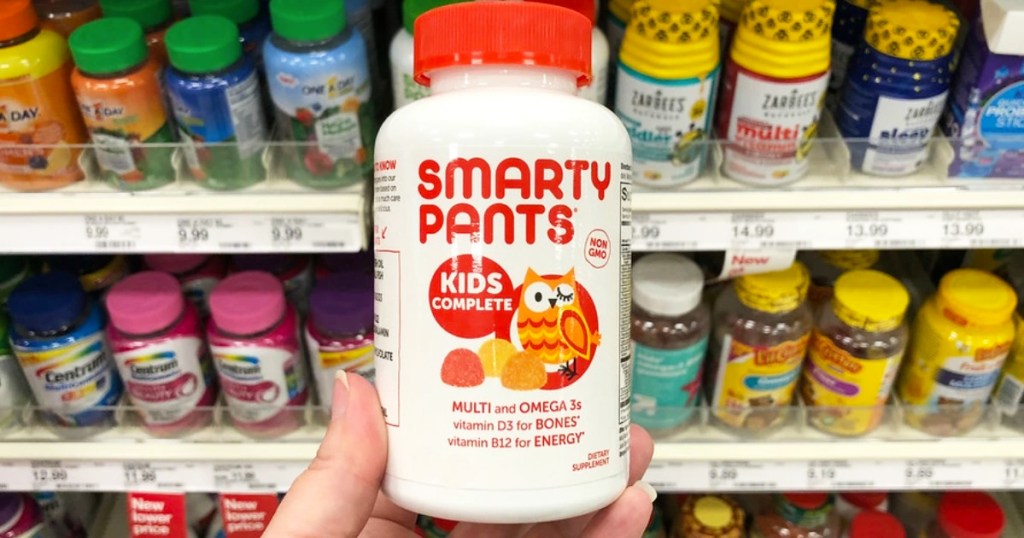 hand holding bottle of SmartyPants Kids Formula Daily Gummy Multivitamins