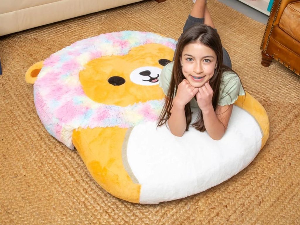 girl laying on a Squishmallows Inflatapal