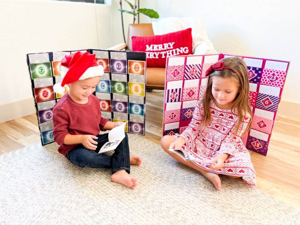kids sitting by Storybook Advent Calendars