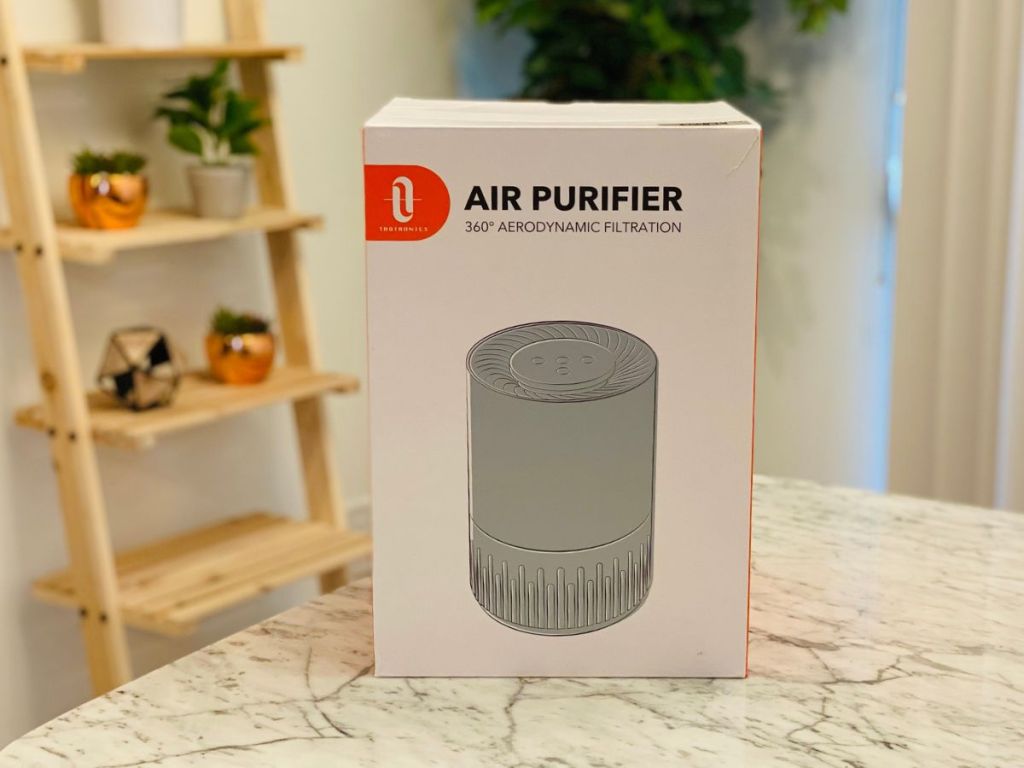 Air Purifier box on marble surface