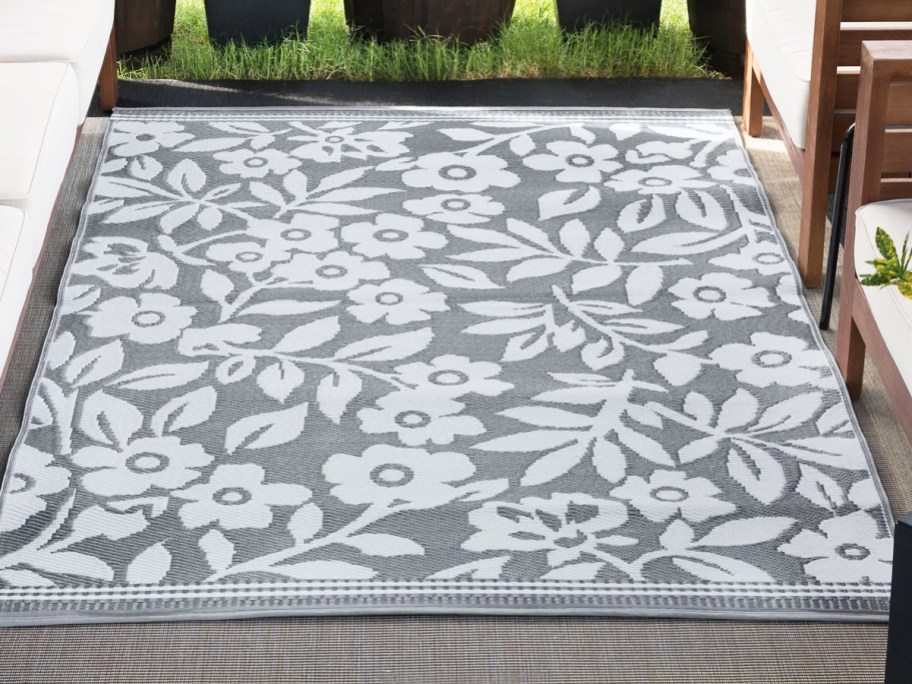 grey and white floral print area rug