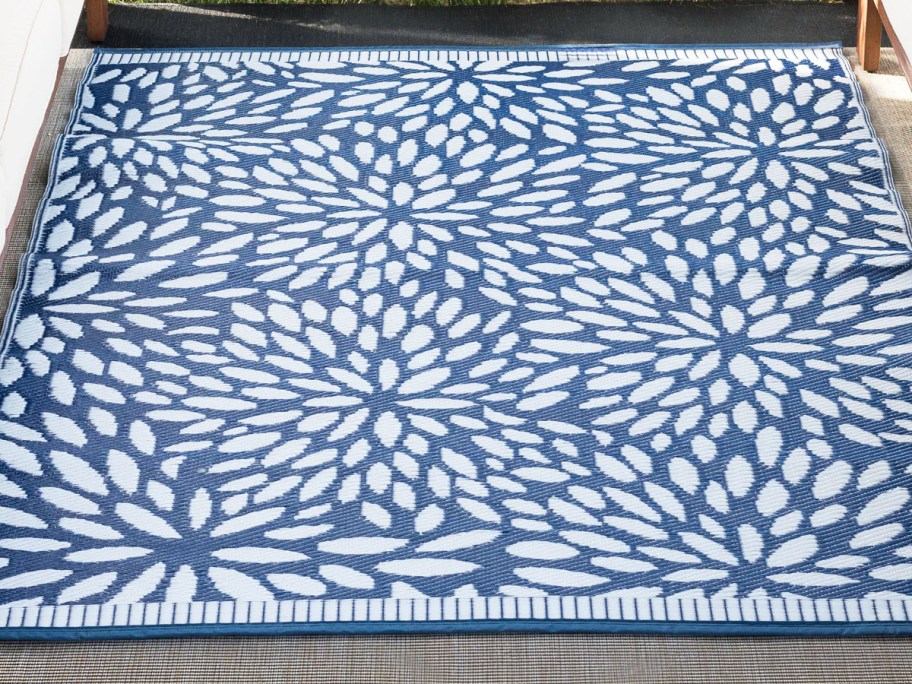 blue and white floral print outdoor area rug