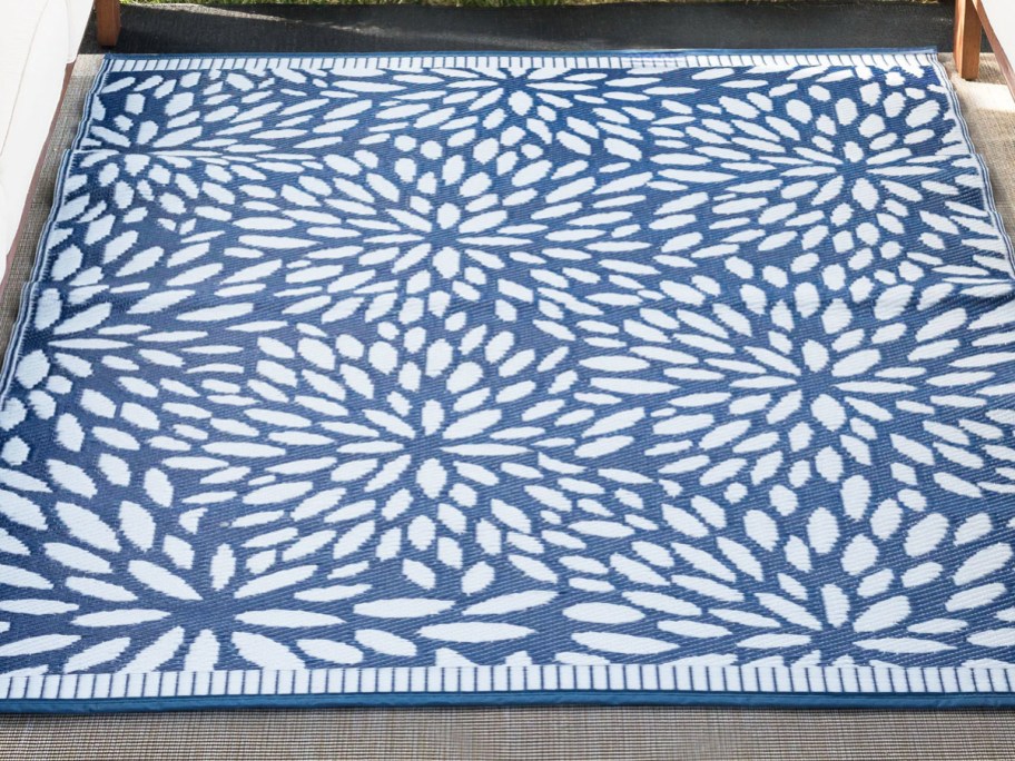 blue and white floral print outdoor area rug
