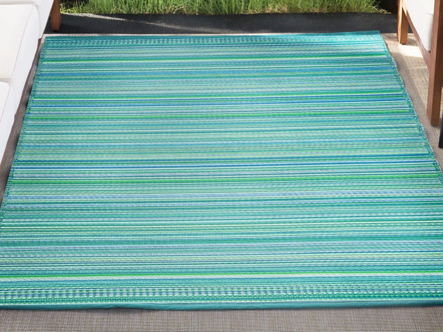 blue and green striped outdoor area rug