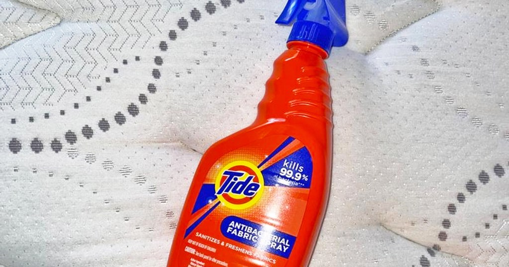 orange bottle of Tide Antibacterial Fabric Spray