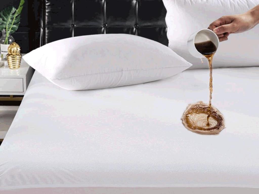 coffee spilling onto waterproof mattress cover