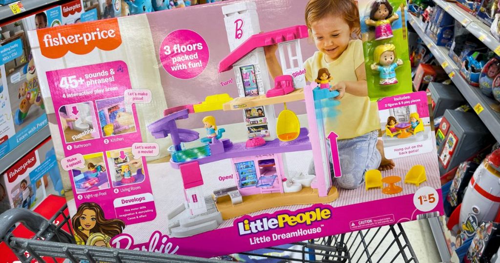 barbie little people dream house in packaging in a shopping cart