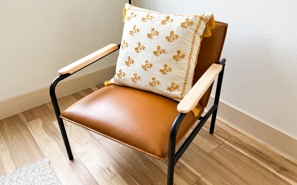 floral pillow on chair