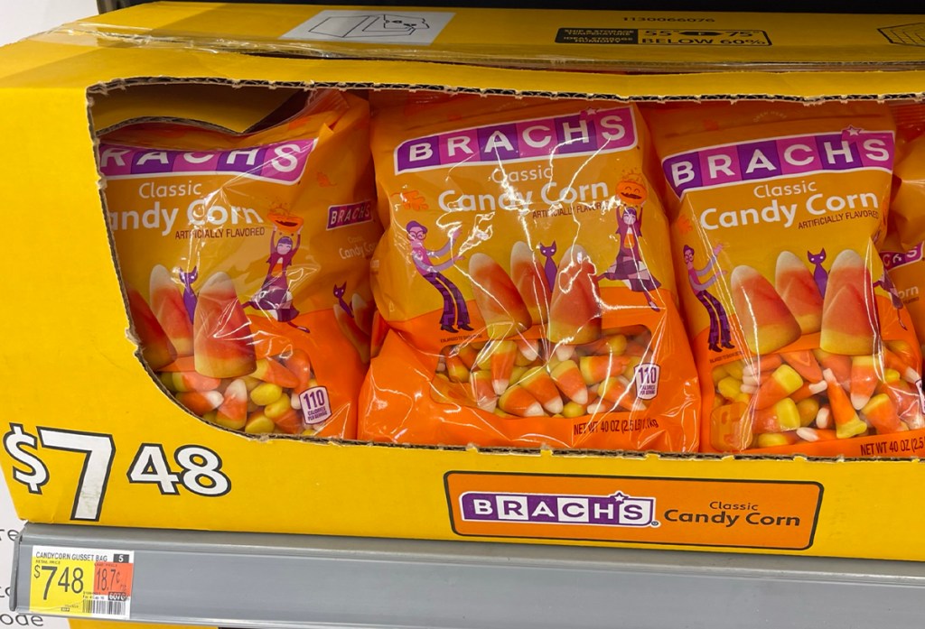 three bags of brachs candy corn in box on shelf in walmart