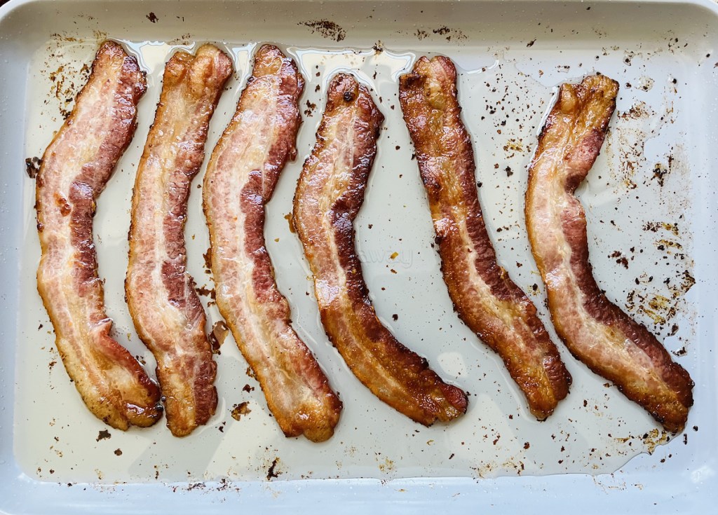 cooked bacon in sheet pan