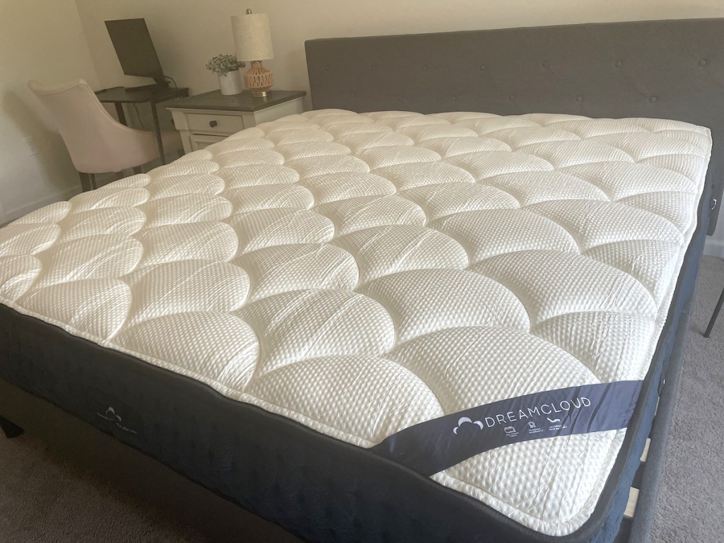 bare dreamcloud mattress on bedframe