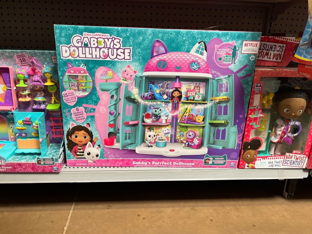 boxed dollhouse on store shelf