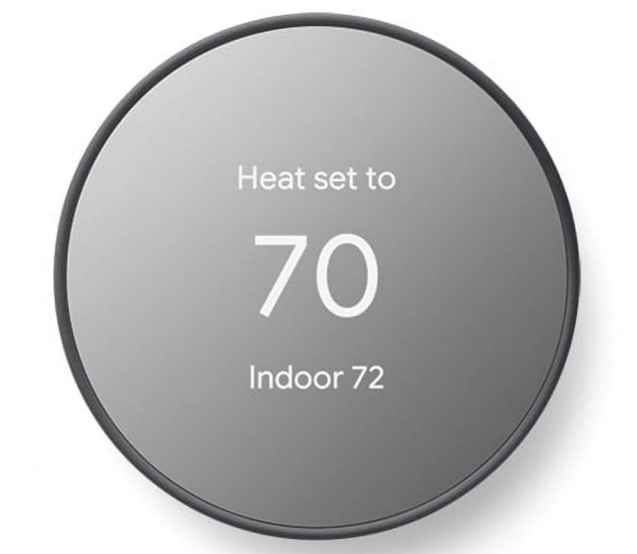an anthracite colored google nest thermostat on a white background