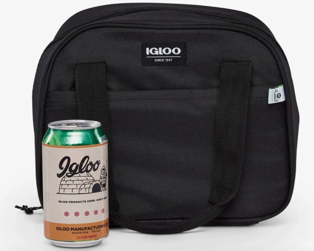 black lunch bag next to drink can