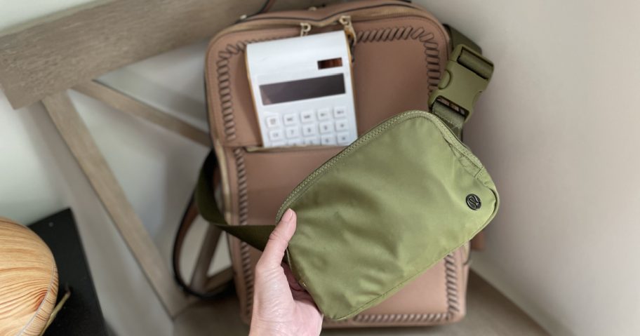 lululemon belt bag on backpack with calculator