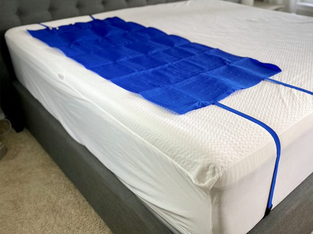 blue cooling pad on mattress 