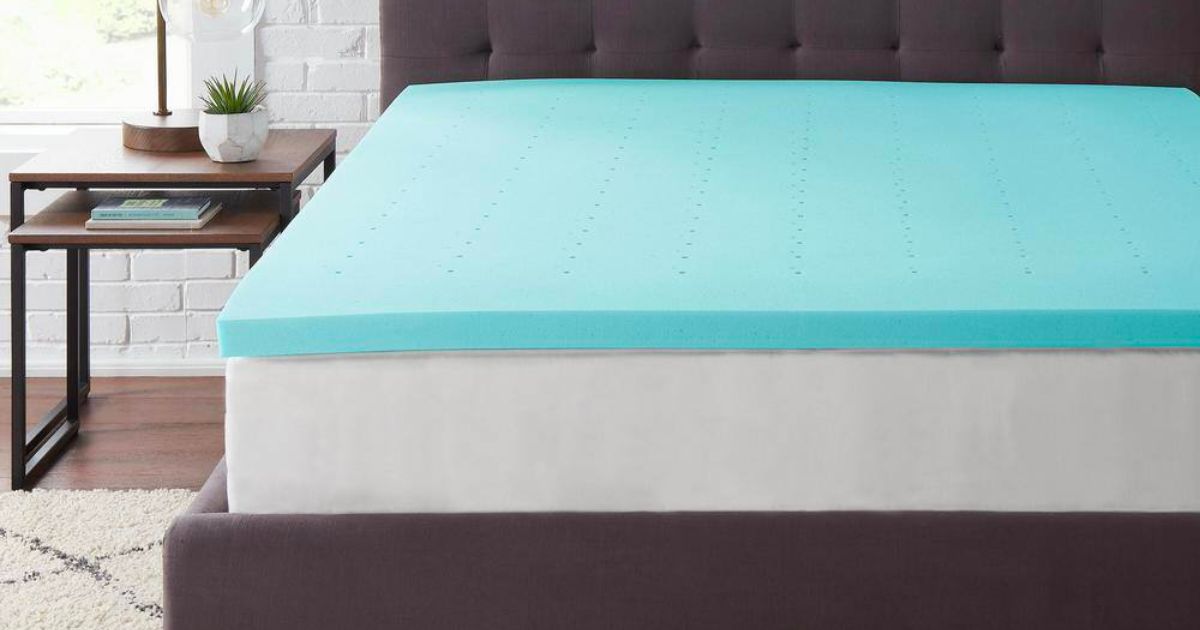 a StyleWell 2inch Gel Infused Memory Foam Mattress Topper on a bed