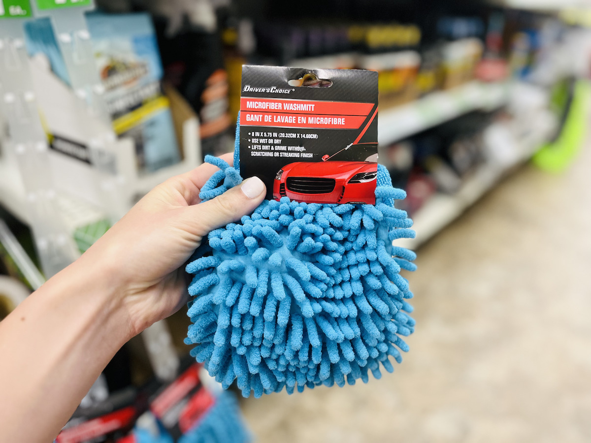 hand holding a blue microfiber mitt for camping ideas