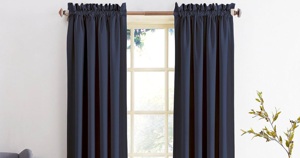 blue curtains hanging at window