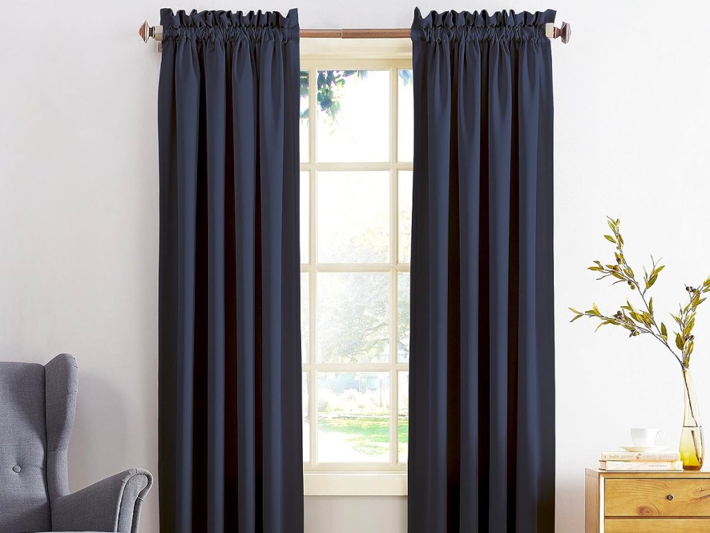 navy blue curtains hanging at window