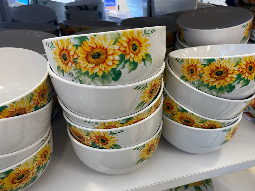 sunflower bowls stacked on shelf