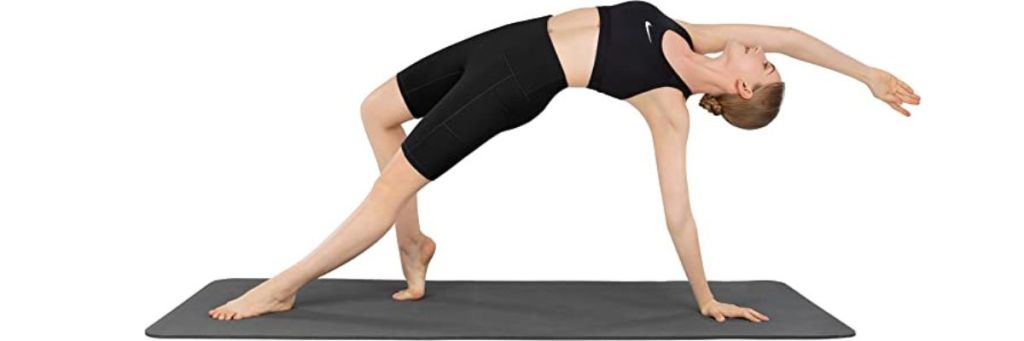 woman wearing yoga shorts doing yoga
