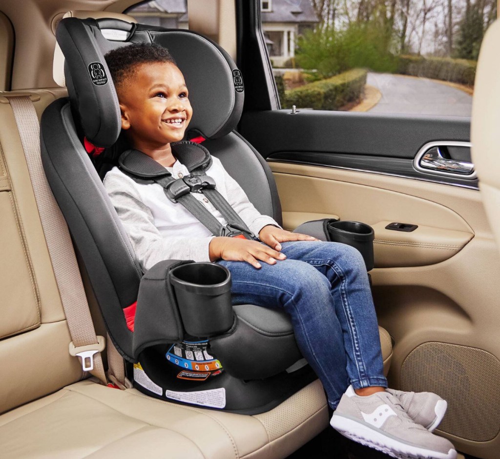 Big Kid in Graco Car Seat