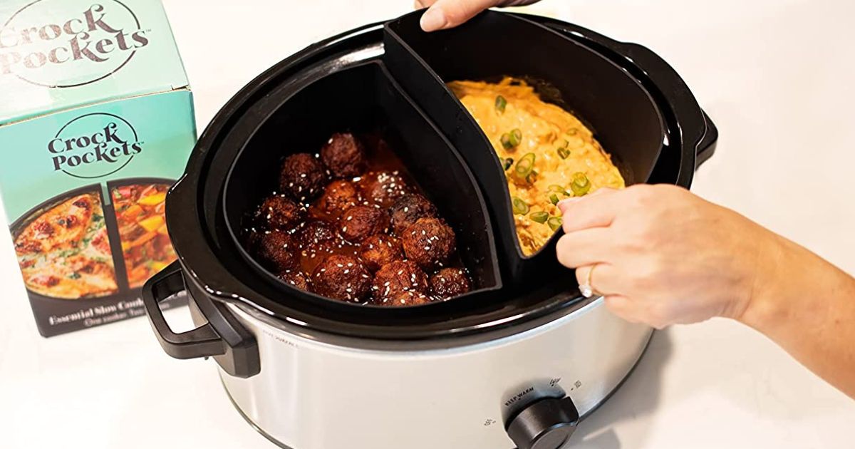 crock pocket slow cooker inserts inside a slow cooker, with one being lifted out by a set of hands
