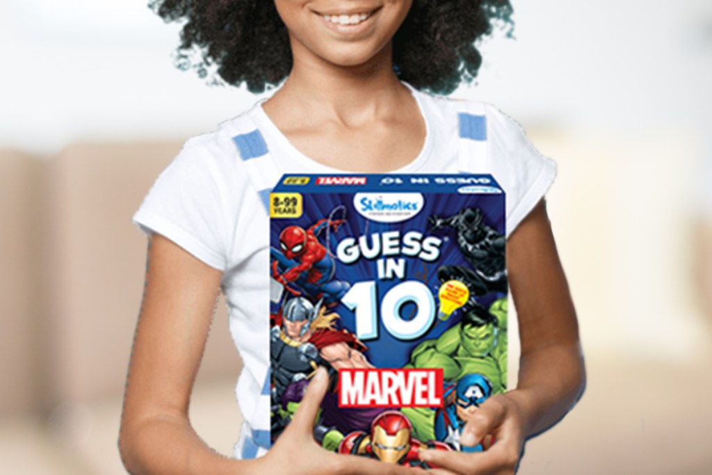 Girl holding Marvel game