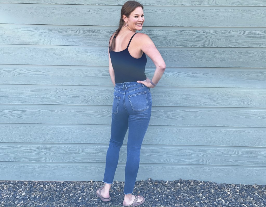 woman wearing good american jeans