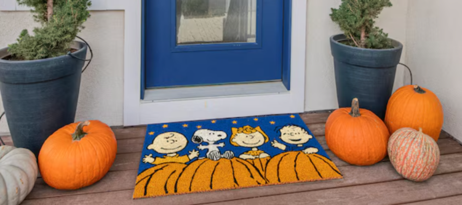 Halloween Door Mat with the Peanuts characters on it