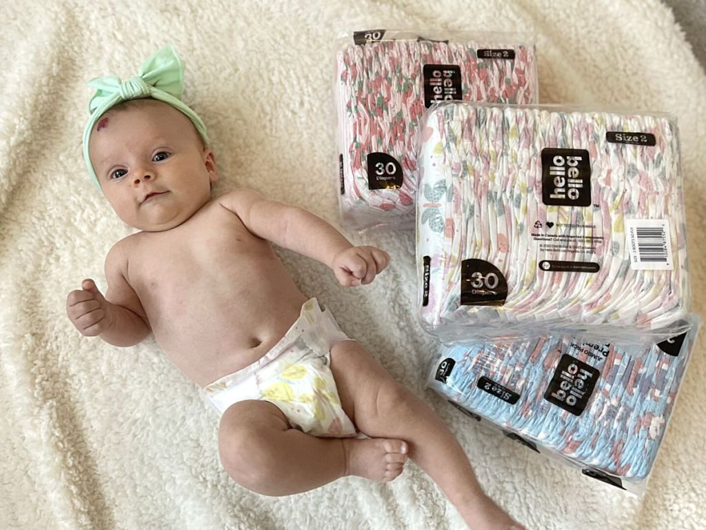 baby laying by Hello Bello diapers