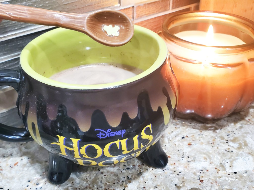 Hocus Pocus Color Changing Mug near candle
