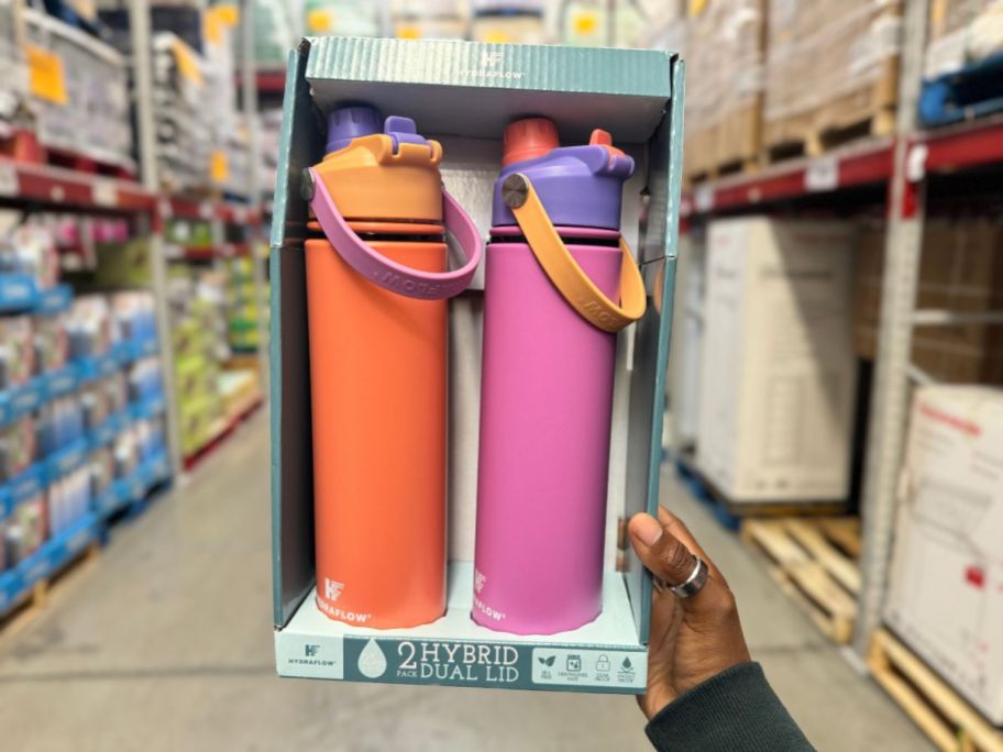 A hand holding a Hydraflow Tumblers 2-Pack in the store
