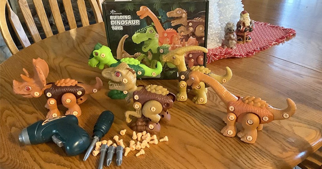 toy dinosaur set on wood table
