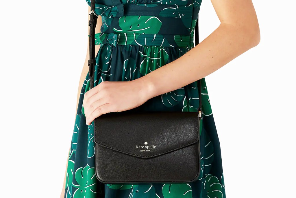 woman with black kate spade crossbody