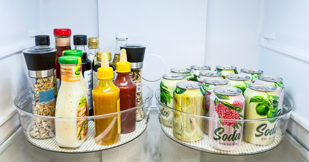 lazy susans in refrigerator filled with condiments