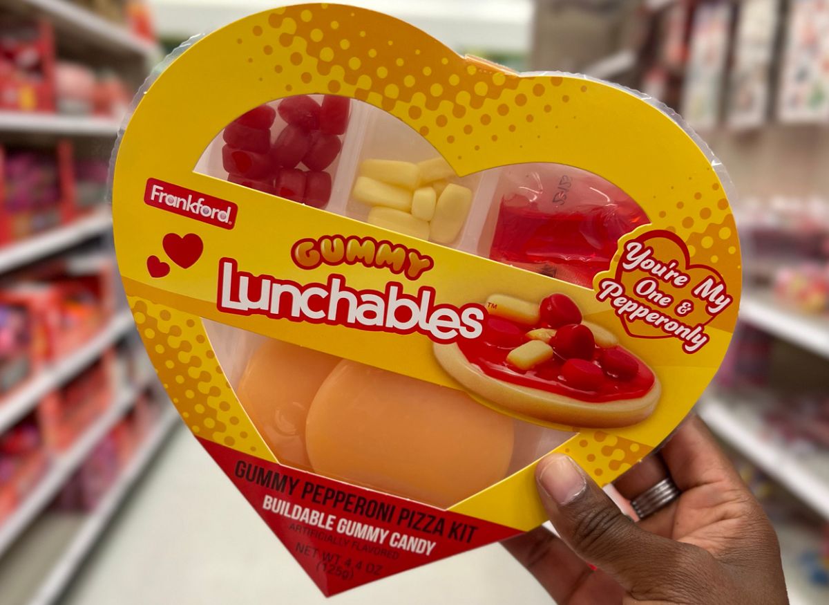 gummy Lunchables pepperoni pizza in a heart shaped box held in hand in a store aisle